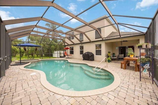 4127 Middle River Ter, Ellenton, FL 34222 - view of swimming pool with a patio, grilling area, a pool with connected hot tub, and glass enclosure