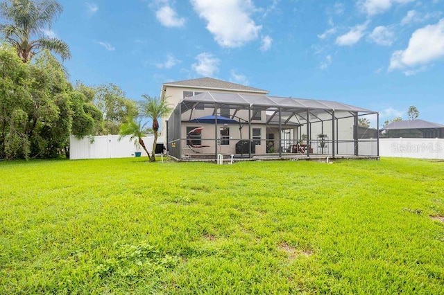 4127 Middle River Ter, Ellenton, FL 34222 - rear view of property featuring a fenced backyard and a lanai
