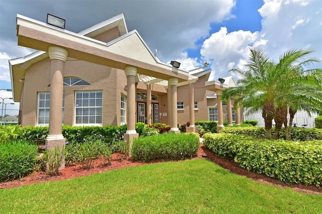 4127 Middle River Ter, Ellenton, FL 34222 - view of front of home featuring a front lawn and stucco siding