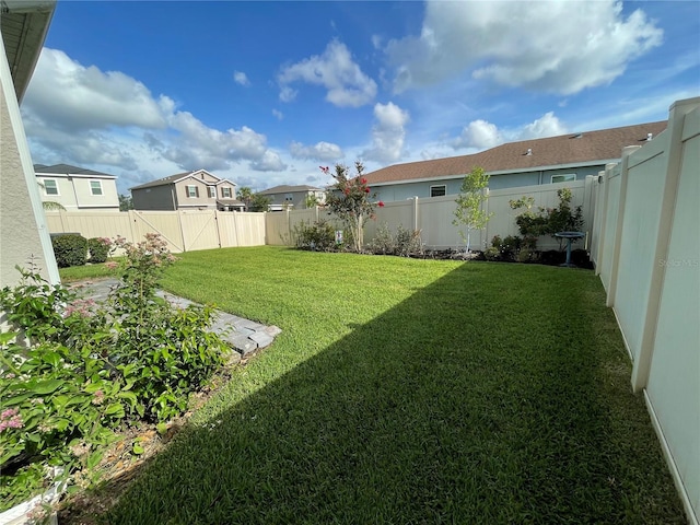5635 Los Robles Ct, Palmetto, FL 34221 - fenced backyard featuring a residential view