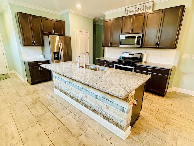 5635 Los Robles Ct, Palmetto, FL 34221 - kitchen featuring stainless steel appliances, ornamental molding, dark brown cabinetry, light stone countertops, and recessed lighting