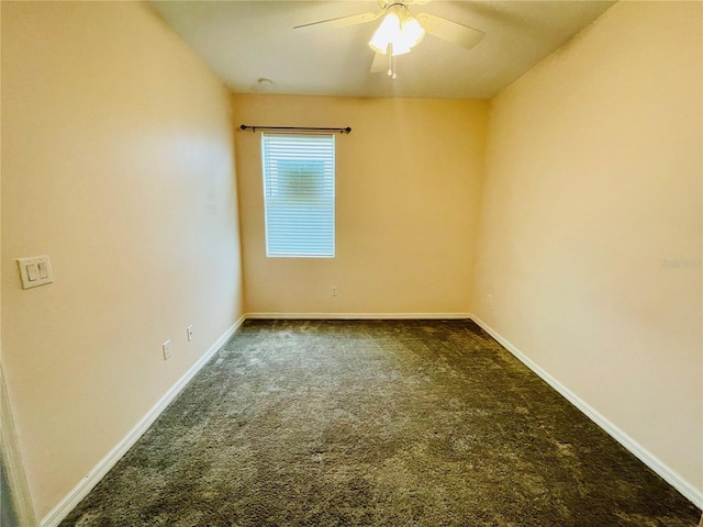 5635 Los Robles Ct, Palmetto, FL 34221 - empty room featuring dark carpet and ceiling fan