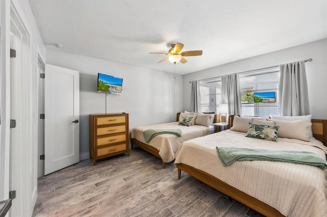 441 62nd St, Holmes Beach, FL 34217 - bedroom featuring wood finished floors and ceiling fan