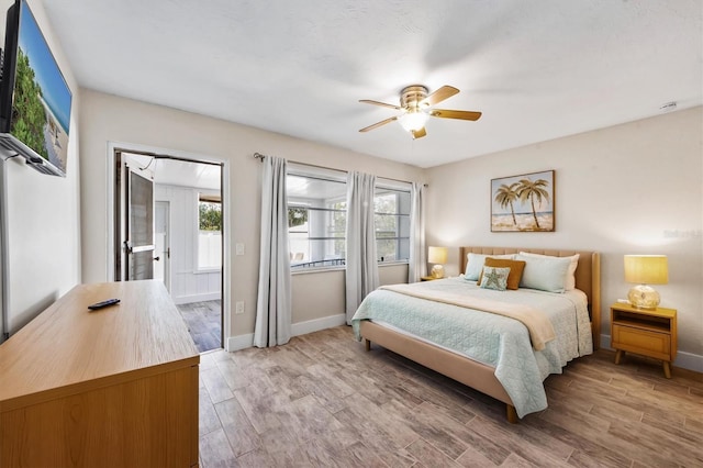 441 62nd St, Holmes Beach, FL 34217 - bedroom featuring multiple windows, light wood-style flooring, and ceiling fan