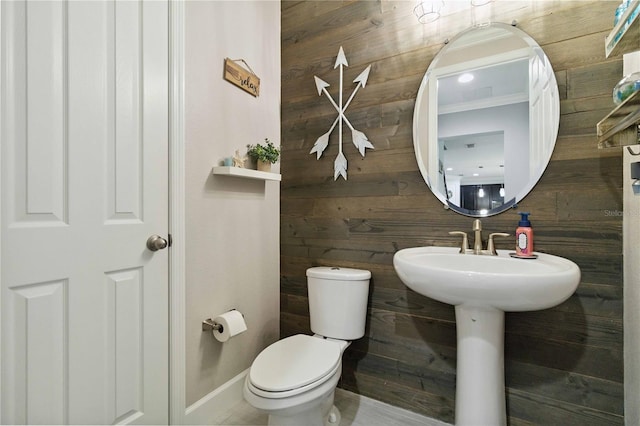 731 116th Ct NE, Bradenton, FL 34212 - bathroom featuring wood walls and toilet