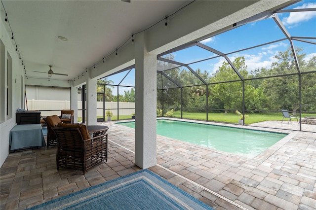 731 116th Ct NE, Bradenton, FL 34212 - outdoor pool with a patio area, an outdoor living space, a ceiling fan, and glass enclosure