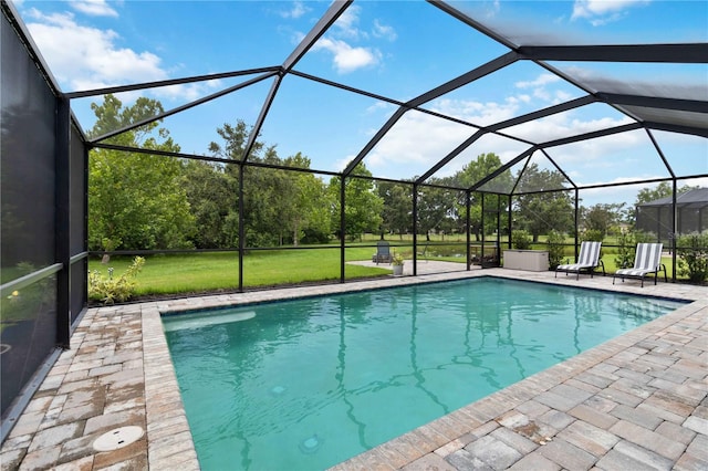 731 116th Ct NE, Bradenton, FL 34212 - outdoor pool with a patio and a lawn