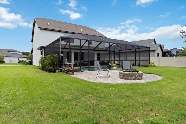 731 116th Ct NE, Bradenton, FL 34212 - back of property with a patio, a fire pit, stucco siding, glass enclosure, and an outdoor pool