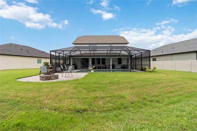 731 116th Ct NE, Bradenton, FL 34212 - rear view of house with a patio, a fire pit, a yard, and a lanai