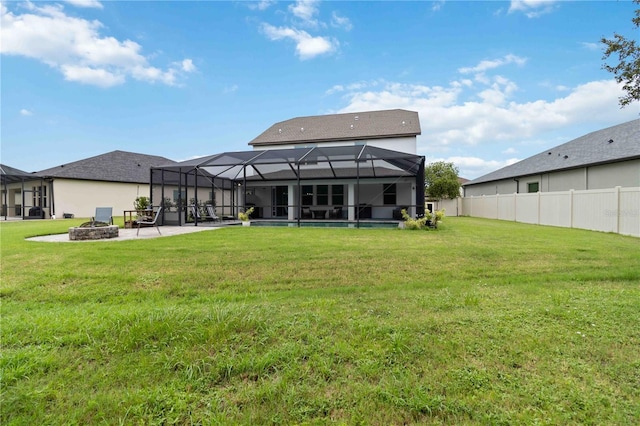 731 116th Ct NE, Bradenton, FL 34212 - back of house with an outdoor fire pit, a patio area, and a lanai