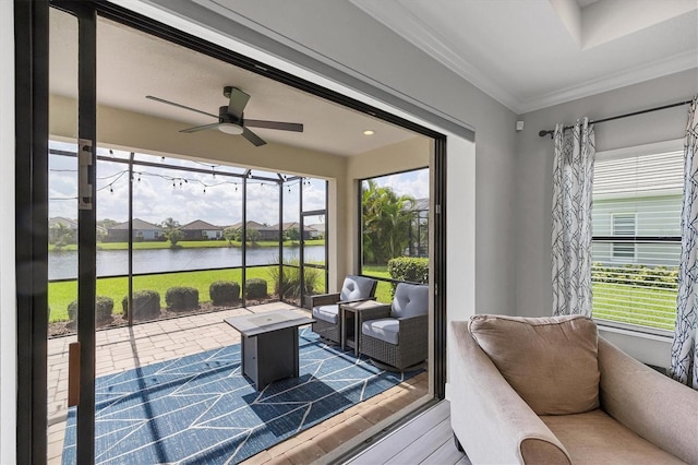 12641 Coastal Breeze Way, Bradenton, FL 34211 - sunroom / solarium with a water view, crown molding, healthy amount of natural light, and wood finished floors