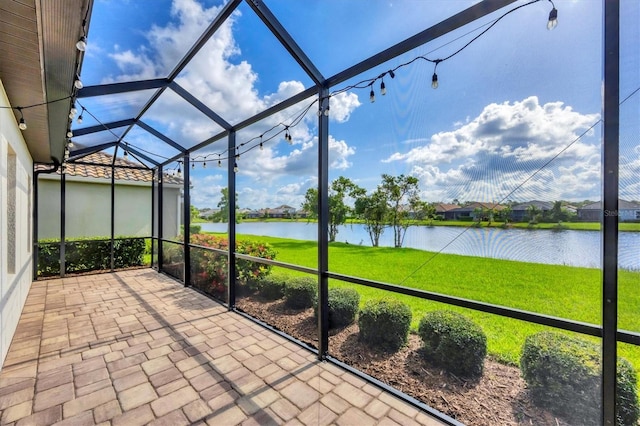 12641 Coastal Breeze Way, Bradenton, FL 34211 - unfurnished sunroom with a water view