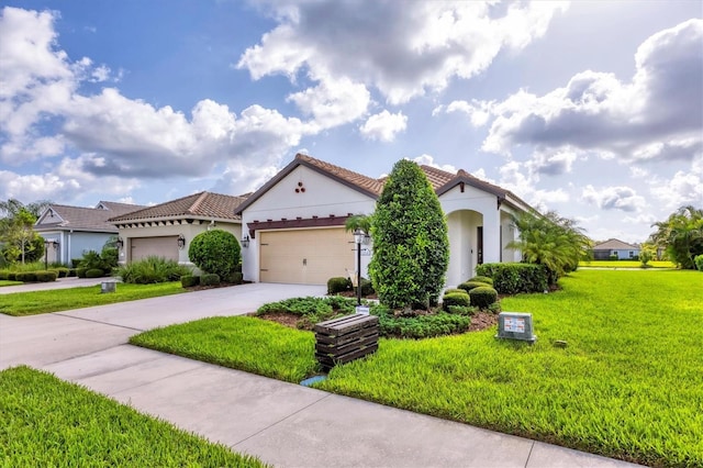 12641 Coastal Breeze Way, Bradenton, FL 34211 - mediterranean / spanish house featuring stucco siding, a front yard, concrete driveway, and a tile roof