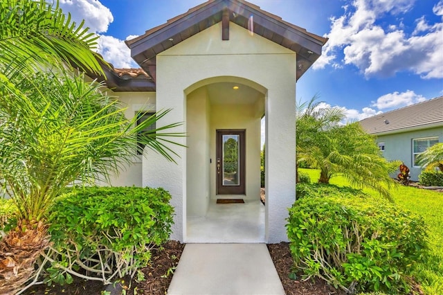 12641 Coastal Breeze Way, Bradenton, FL 34211 - view of exterior entry featuring stucco siding