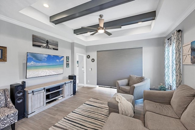 12641 Coastal Breeze Way, Bradenton, FL 34211 - living room with a tray ceiling, light wood-style flooring, ceiling fan, crown molding, and beam ceiling