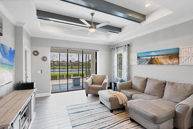 12641 Coastal Breeze Way, Bradenton, FL 34211 - living area with a raised ceiling, ceiling fan, ornamental molding, light wood-type flooring, and recessed lighting