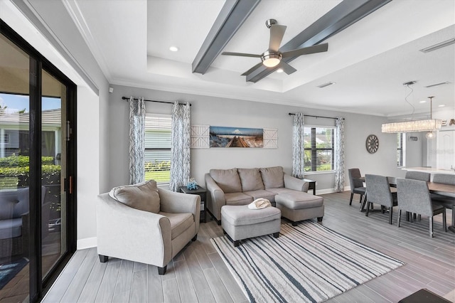 12641 Coastal Breeze Way, Bradenton, FL 34211 - living area featuring wood finished floors, recessed lighting, ornamental molding, and ceiling fan