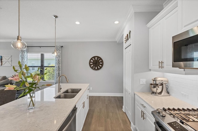 12641 Coastal Breeze Way, Bradenton, FL 34211 - kitchen featuring stainless steel appliances, dark wood-style floors, crown molding, tasteful backsplash, and light stone counters