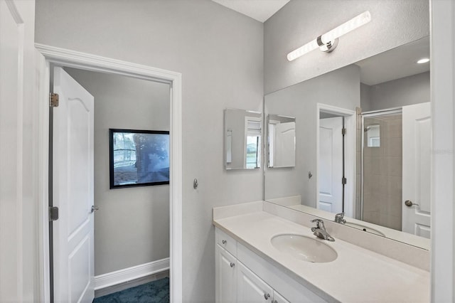 12641 Coastal Breeze Way, Bradenton, FL 34211 - bathroom featuring vanity and tiled shower