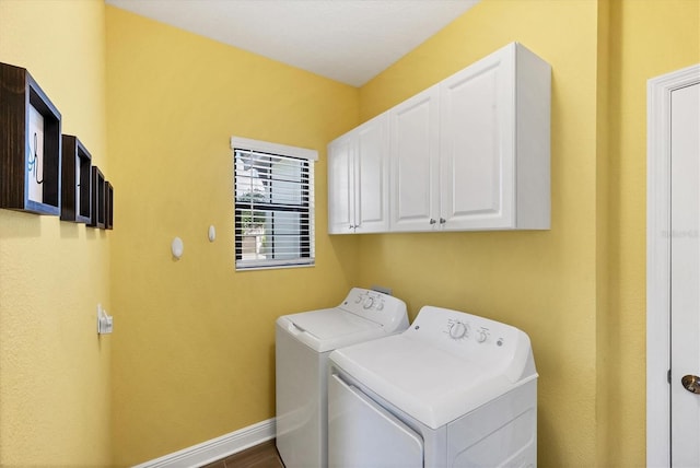 12641 Coastal Breeze Way, Bradenton, FL 34211 - laundry area featuring washing machine and dryer and cabinet space