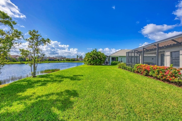 12641 Coastal Breeze Way, Bradenton, FL 34211 - view of grassy yard with a water view and glass enclosure