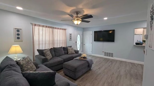 3614 29th Ave W, Bradenton, FL 34205 - living room featuring wood finished floors, ceiling fan, and recessed lighting