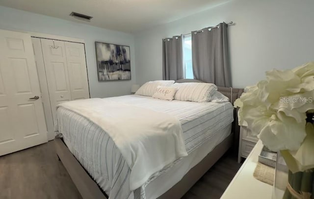 3614 29th Ave W, Bradenton, FL 34205 - bedroom featuring dark wood-style flooring and a closet