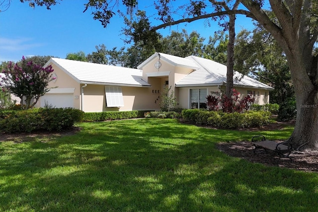 7904 Hampton Ct, University Park, FL 34201 - ranch-style home with a front yard, an attached garage, and stucco siding