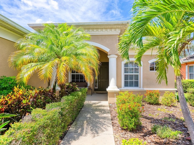 280 Dahlia Ct, Bradenton, FL 34212 - entrance to property with stucco siding