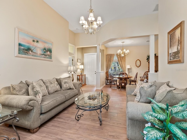 280 Dahlia Ct, Bradenton, FL 34212 - living area featuring a chandelier and light wood finished floors