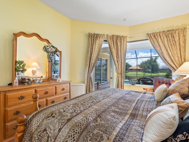 280 Dahlia Ct, Bradenton, FL 34212 - bedroom featuring access to exterior