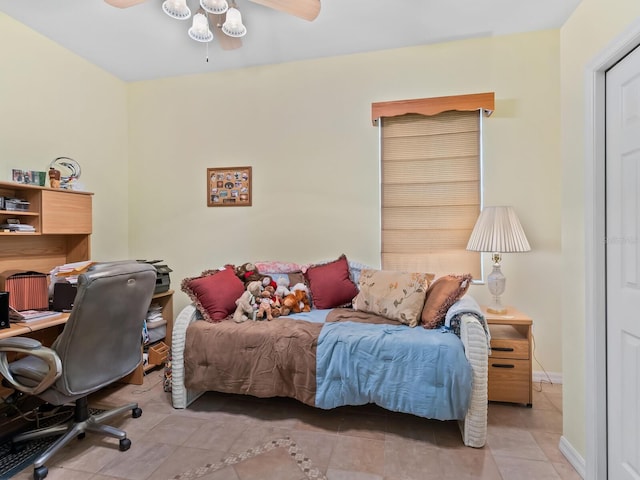 280 Dahlia Ct, Bradenton, FL 34212 - bedroom with light tile patterned floors, an office area, and a ceiling fan