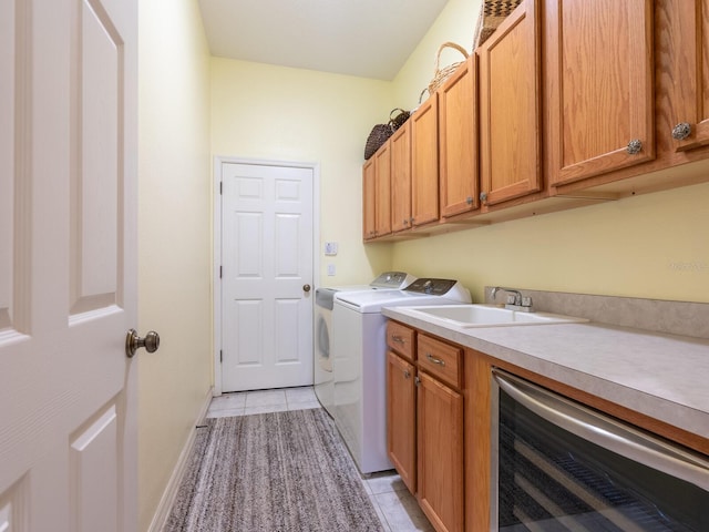 280 Dahlia Ct, Bradenton, FL 34212 - laundry room featuring wine cooler, washer and dryer, cabinet space, and light tile patterned floors