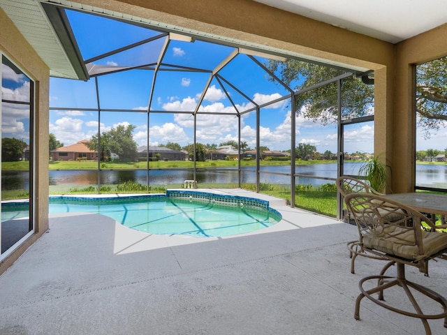 280 Dahlia Ct, Bradenton, FL 34212 - swimming pool with a water view, a patio area, and glass enclosure