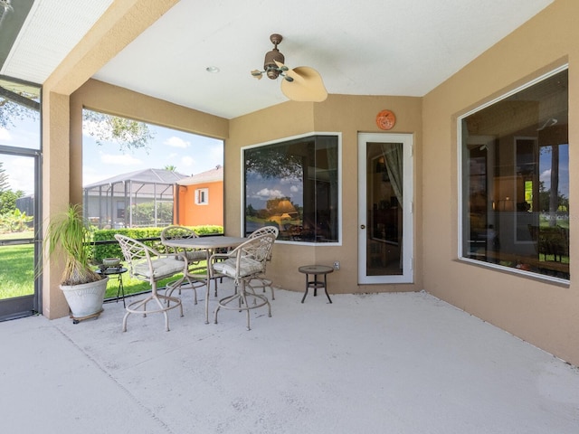 280 Dahlia Ct, Bradenton, FL 34212 - sunroom featuring ceiling fan and outdoor dining area