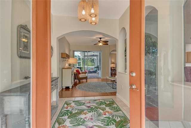 730 137th St NE, Bradenton, FL 34212 - tiled entrance foyer with arched walkways and ceiling fan