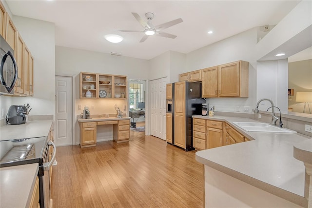 730 137th St NE, Bradenton, FL 34212 - kitchen featuring appliances with stainless steel finishes, open shelves, ceiling fan, light wood-type flooring, and a peninsula