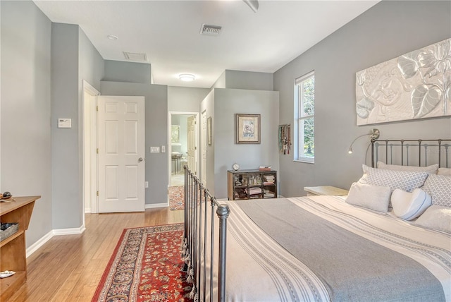 730 137th St NE, Bradenton, FL 34212 - bedroom featuring light wood-style flooring and baseboards