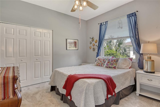 730 137th St NE, Bradenton, FL 34212 - bedroom featuring light colored carpet, a closet, and ceiling fan