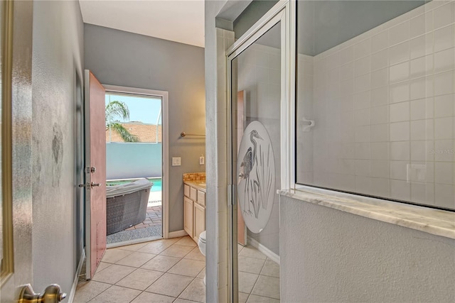 730 137th St NE, Bradenton, FL 34212 - full bathroom with tiled shower, vanity, and tile patterned floors