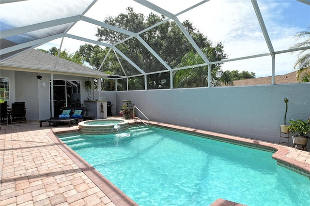 730 137th St NE, Bradenton, FL 34212 - view of swimming pool with a patio area, a pool with connected hot tub, and glass enclosure