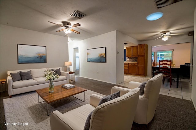 1208 Francis Ave, Sarasota, FL 34232 - living room with ceiling fan, light carpet, and light tile patterned floors