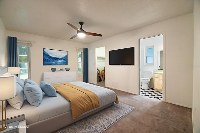 1208 Francis Ave, Sarasota, FL 34232 - carpeted bedroom with connected bathroom and a ceiling fan