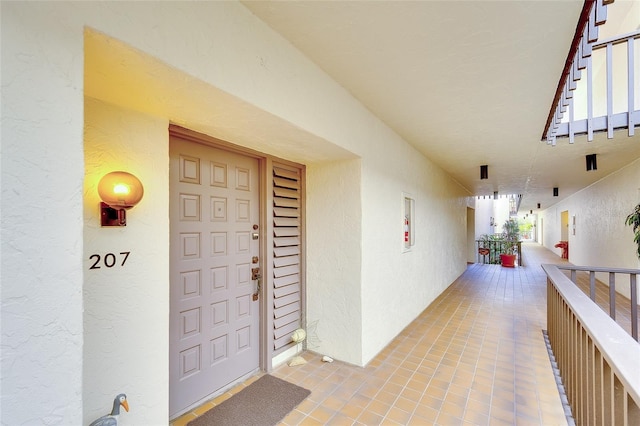 2039 Gulf Of Mexico Dr Unit G3-207, Longboat Key, FL 34228 - entrance to property featuring stucco siding and a balcony