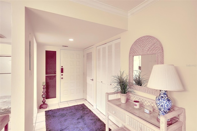 2039 Gulf Of Mexico Dr Unit G3-207, Longboat Key, FL 34228 - foyer entrance with light tile patterned flooring, crown molding, and recessed lighting