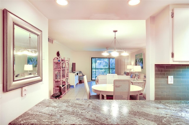 2039 Gulf Of Mexico Dr Unit G3-207, Longboat Key, FL 34228 - dining area with crown molding, light tile patterned floors, and recessed lighting