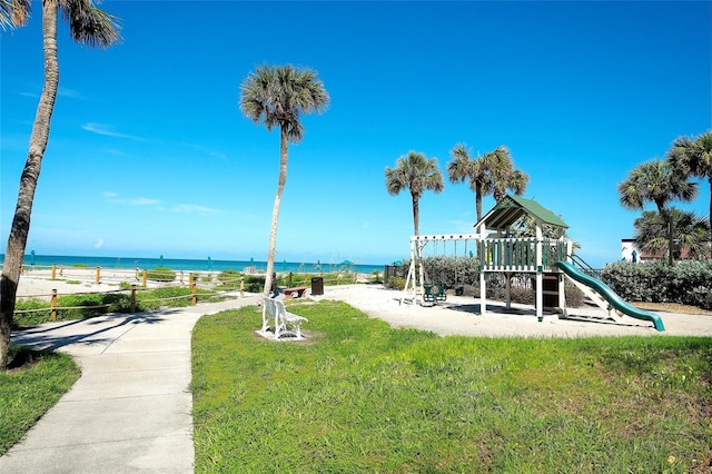 2039 Gulf Of Mexico Dr Unit G3-207, Longboat Key, FL 34228 - community play area featuring view of water and beach and a yard