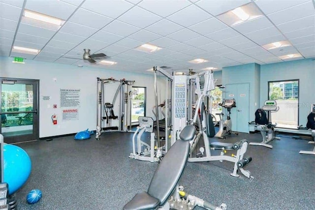 2039 Gulf Of Mexico Dr Unit G3-207, Longboat Key, FL 34228 - workout area featuring healthy amount of natural light and a paneled ceiling