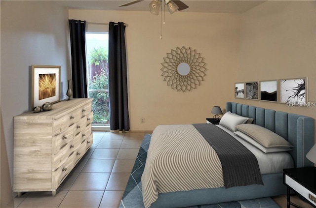 2763 Woodgate Ln Unit 105, Sarasota, FL 34231 - tiled bedroom featuring multiple windows