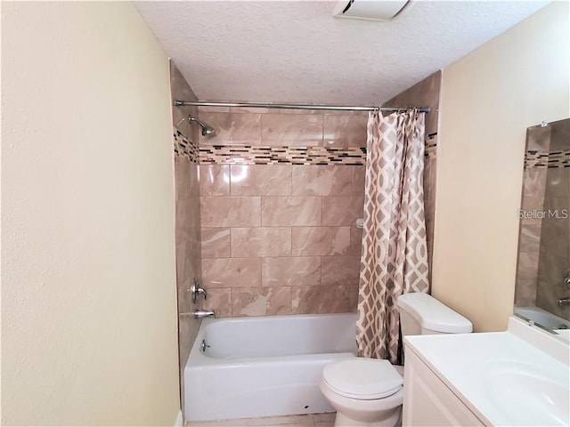 2763 Woodgate Ln Unit 105, Sarasota, FL 34231 - bathroom with shower / tub combo with curtain, vanity, and a textured ceiling